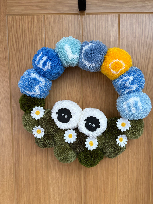 Handmade welcome sheep pom pom door wreath by The PomPom Lodge